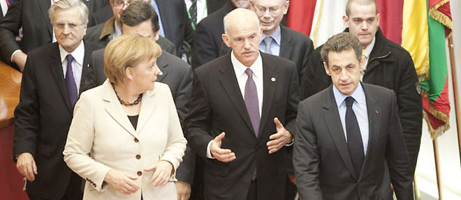 Jean-Claude Trichet, Angela Merkel, Georges Papandreou, Nicolas Sarkozy et Herman Von Rompuy (a l''arriere plan) discutent lors d'un sommet a Bruxelles en fevrier dernier(C) OLIVIER HOSLET / EPA