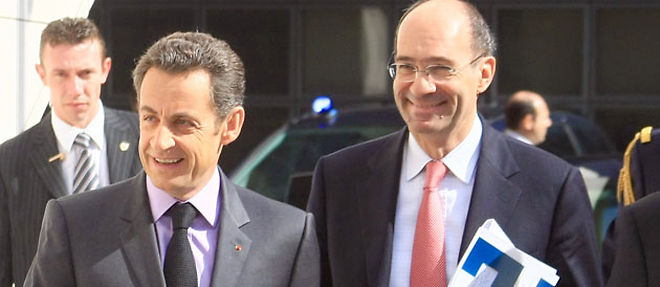 Nicolas Sarkozy avait deja pris la defense d'Eric Woerth en marge du G20 de Toronto, samedi soir (C) AFP