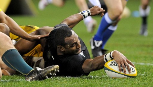 New Zealand All Blacks winger Joe Rokocoko touches down to score against the Australian Wallabies in their Tr-Nations and Bledisoe Cup rugby union Test match, in Melbourne on July 31, 2010. The All Blacks lead 32-14 at half-time. RESTRICTED TO EDITORIAL USE NO ADVERTISING USE NO PROMOTIONAL USE NO MERCHANDISING USE AFP PHOTO/William WEST