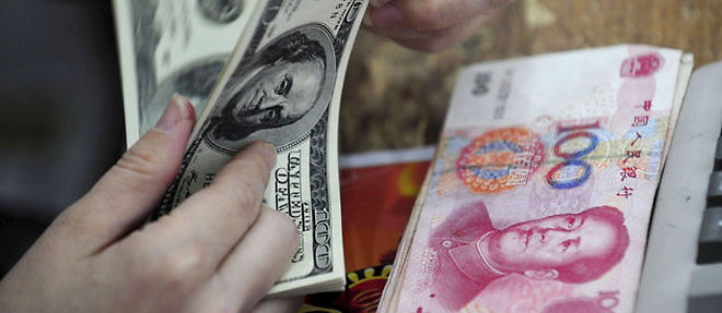 Des economistes du Fonds monetaire international (FMI) estiment que le yuan est sous-evalue de 5 % a 27 % face au dollar (C) Sipa