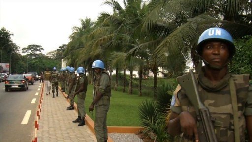 Crise en Cote d'Ivoire: tirs dans la nuit a Abidjan, Gbagbo bientot investi