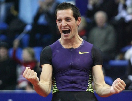 France's Renaud Lavillenie celebrates after winning the Athletics International indoor meeting "Pole Vault Stars" with a jump of 5.93m in the eastern Ukrainian city of Donetsk on February 12, 2011. AFP PHOTO / ALEKSANDER KHUDOTEPLY