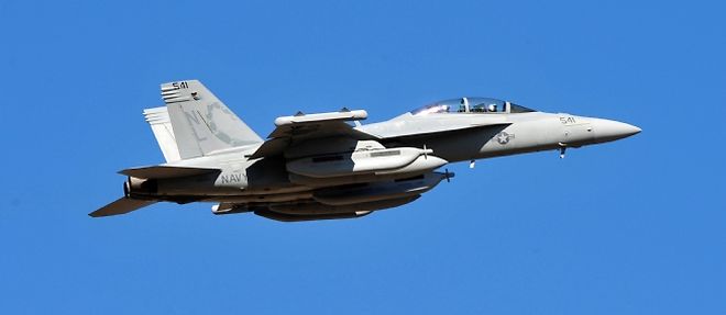 Les Americains considerent le debut de l'intervention militaire de la coalition comme un succes (ici, un F18 americain se prepare a faire respecter la zone d'exclusion aerienne).