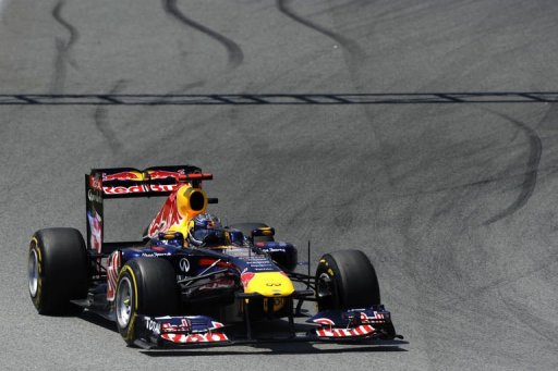 L'Allemand Sebastian Vettel (Red Bull) a remporte le Grand Prix d'Espagne de Formule 1, cinquieme epreuve de la saison, devant les deux McLaren des Britanniques Lewis Hamilton et Jenson Button, dimanche a Barcelone.