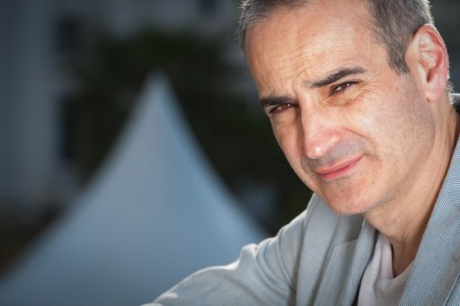 French director and member of the jury, Olivier Assayas poses during a photo session on May 11, 2011 in Cannes, a few hours before the opening ceremony of the 64th International Cannes Film Festival. AFP PHOTO / MARTIN BUREAU