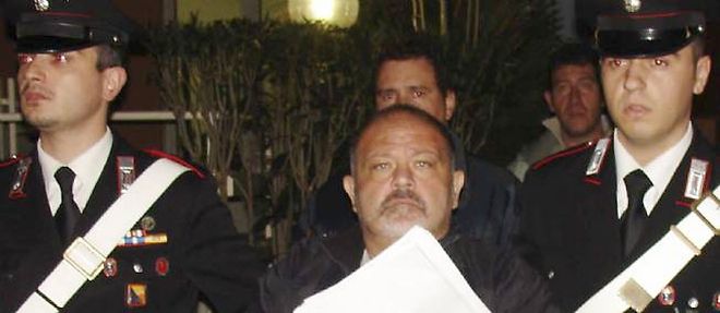 Michele Catalano lors de son arrestation le 29 novembre 2007 a Palerme. Il etait en train de regarder la serie "The Boss of Bosses" sur l'arrestation du parrain Salvatore "Toto" Riina en 1993. 