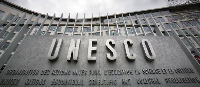 Le conseil executif de l'Unesco a approuve a une forte majorite, par 40 voix sur 58, une recommandation d'attribuer a la Palestine un statut de membre a part entiere.