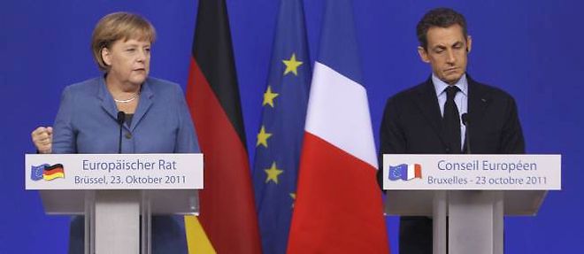 Nicolas Sarkozy et Angela Merkel se disent determines a aboutir a un accord global "ambitieux et durable" mercredi, lors du second sommet europeen prevu.