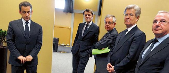 Le president Nicolas Sarkozy en deplacement a Marseille pour le congres du Parti populaire europeen, le 8 decembre dernier, avec Francois Baroin, Xavier Musca et Jean-David Levitte.