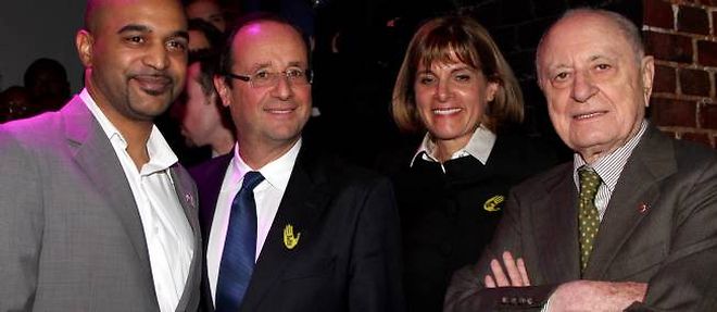 Francois Hollande etait au diner annuel des parrains de SOS Racisme avec Dominique Sopo, le president de l'association, Anne Lauvergeon et Pierre Berge.