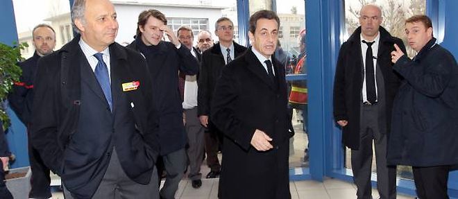 Laurent Fabius et Nicolas Sarkozy le 24 fevrier 2012.