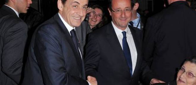 Nicolas Sarkozy et Francois Hollande ont echange une poignee de main lors du diner du Crif, en fevrier dernier. 