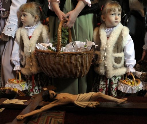 Polish children take part in an Easter Saturday blessing in a church in Bialy Dunajec on April 3, 2010. AFP PHOTO /JANEK SKARZYNSKI