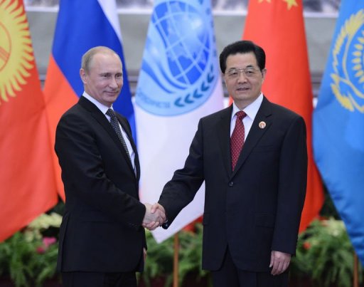 La Chine et la Russie se sont engagees mercredi a Pekin a renforcer leur partenariat strategique, a agir de facon concertee au sujet de la Syrie et a etendre leur influence en Afghanistan a l'approche du retrait des forces de l'Otan.