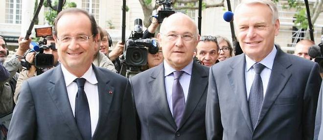 Francois Hollande, Michel Sapin et Jean-Marc Ayrault.
