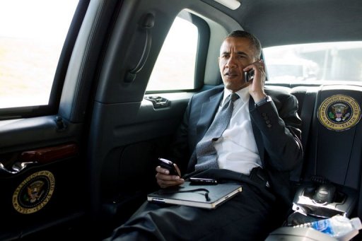 This picture provided by the White House shows US President Barack Obama talking on the phone with Aurora Mayor Steve Hogan during the motorcade ride to Palm Beach International Airport in Palm Beach, Florida, on July 20, 2012. Obama called Mayor Hogan to offer his condolences and support to the Aurora community following the shocking shooting at a movie theater that left 12 people dead and over 50 injured. AFP PHOTO/The White House/Pete SOUZA/HO ++RESTRICTED TO EDITORIAL USE / MANDATORY CREDIT: "AFP PHOTO / THE WHITE HOUSE / PETE SOUZA" / NO SALES / NO MARKETING / NO ADVERTISING CAMPAIGNS / D