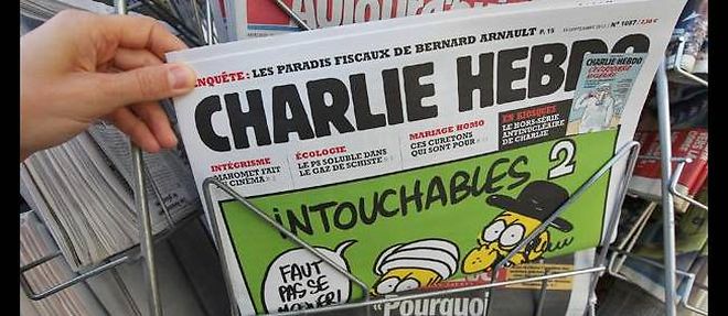 La presse fait front jeudi au nom de la liberte d'expression derriere "Charlie Hebdo".