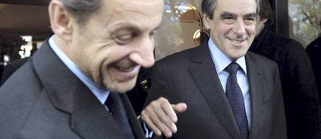 Nicolas Sarkozy et Francois Fillon, lors d'un dejeuner le 24 octobre a Paris.