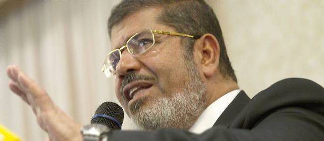 Le president egyptien Mohamed Morsi a des pouvoirs de plus en plus etendus.