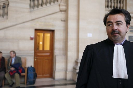 Eric Maurin, lawyer of French soldier Lianrifou Ben Youssouf's arrives at the Criminal Court in Paris, on November 27, 2012, prior to the opening of the trial of his client, who appears along with three other former military Frenchmen of the French military force, Operation Licorne (Unicorn), in Ivory Coast for the alleged murder of Ivorian Firmin Mahe, in 2005. Mahe, 29, had been choked to death with a plastic bag on his head as he was detained by French troops in an armoured vehicle. AFP PHOTO /KENZO TRIBOUILLARD