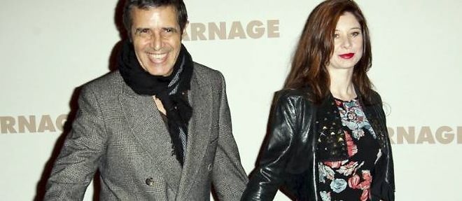 Julien Clerc et Helene Gremillon a la premiere de "Carnage" en novembre 2011.