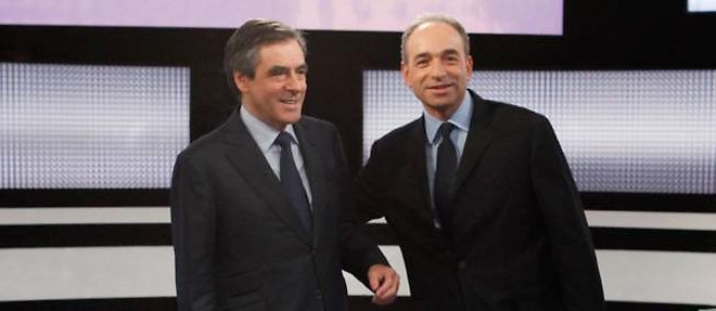 Francois Fillon et Jean-Francois Cope sur le plateau de "Des paroles et des actes" sur France 2, le 25 octobre 2012.