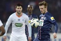 Pour son premier titulaire sous les couleurs parisiennes, David Beckham a impose sa classe au Parc des princes et aux joueurs marseillais. (C)Franck Fife