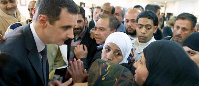 Bachar el-Assad lors de l'une de ses rares apparitions publiques, le 20 mars 2013.