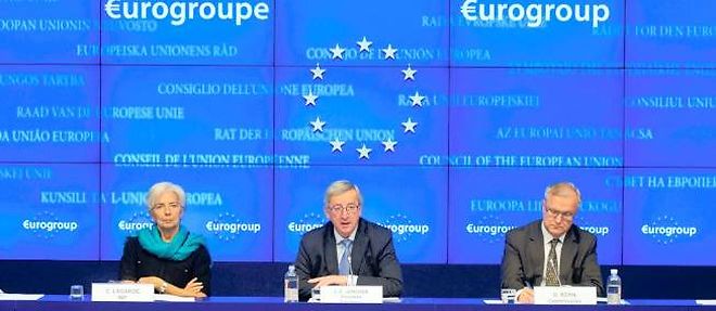 La presidente du FMI Christine Lagarde, le president de l'Eurogroupe Jean-Claude Juncker et le commissaire europeen pour les affaires economiques et monetaires Olli Rehn.
