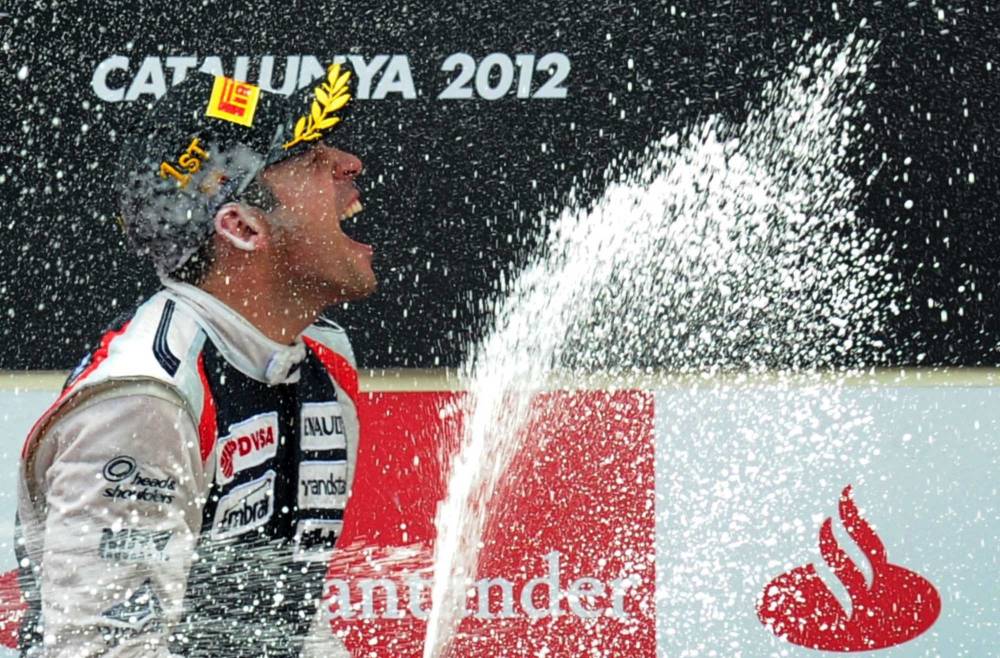 Pastor Maldonado, sur le podium du circuit de Catalogne, l'an dernier. © LLUIS GENE / AFP ©  LLUIS GENE / AFP