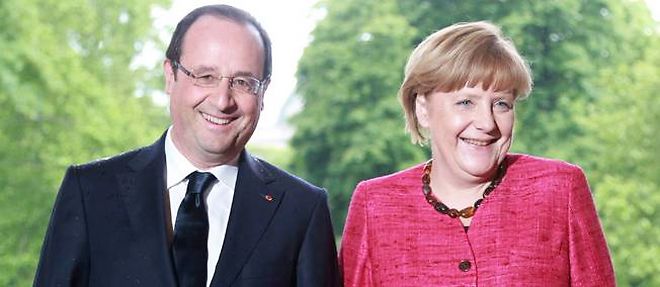 Francois Hollande et Angela Merkel, jeudi a Paris.