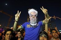 Iran: Rohani salu&eacute; par la presse et le monde, mais face &agrave; des d&eacute;fis