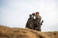 Un soldat francais aux cotes d'un soldat malien le 23 janvier 2013. (C)Fred Dufour