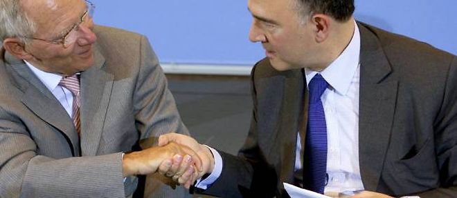 Pierre Moscovici et Wolfgang Schauble devront s'entendre sur une procedure de mise en faillite des banques qui fasse le moins possible appel a l'argent du contribuable europeen (photo d'illustration).