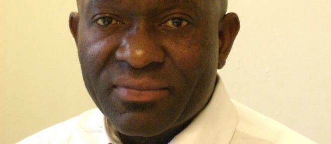 "Au FN, j'ai trouve des gens normaux", explique Mungo Shematsi, candidat aux municipales a Saint-Martin-d'Heres (Isere).