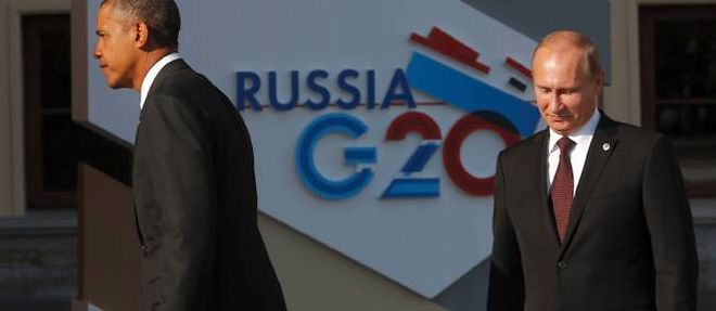 Barack Obama et Vladimir Poutine, apres s'etre serre la main, jeudi soir a Saint-Petersbourg.