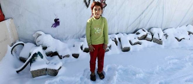 Une petite refugiee a Ankara. Elle porte des sandales, precise le photojournaliste.