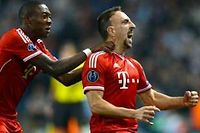 David Alaba et Franck Ribéry. ©Paul Ellis / AFP