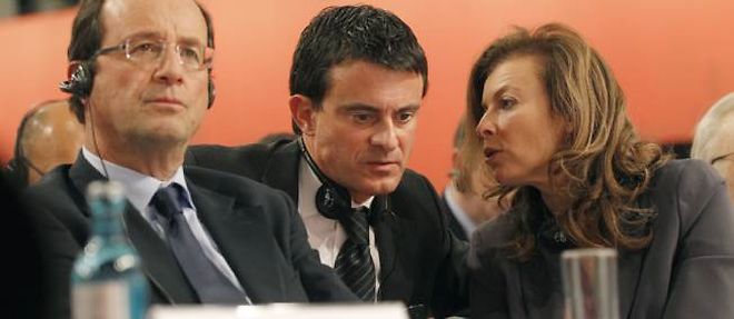 Francois Hollande, Manuel Valls et Valerie Trierweiler, le 5 decembre 2011 a Berlin.