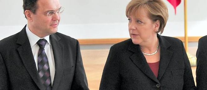 Hans-Peter Friedrich et Angela Merkel, ici en 2011.