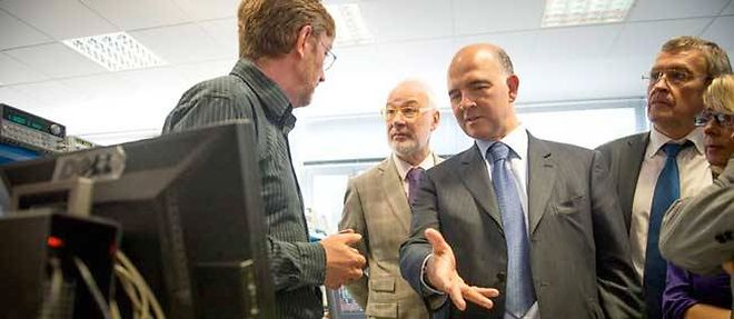 Le ministre de l'Economie et des Finances, Pierre Moscovici, en aout 3013 le projet PEA-PME.