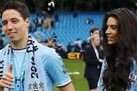 Samir Nasri et sa petite amie, après le titre de champion d'Angleterre 2014 obtenu avec Manchester City. ©Matt West / BPI/REX/REX/SIPA