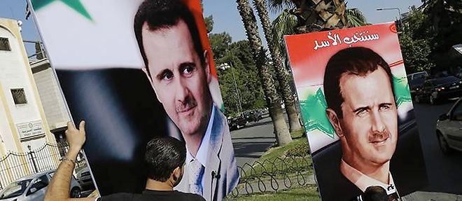 Les affiches de campagne pour la reelection de Bachar el-Assad ont ete installees dans les rues de Damas.