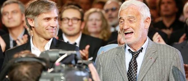 Jean-Paul Belmondo tourne un documentaire autobiographique avec son fils Paul (a gauche), co-producteur du film.