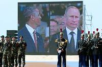 Le montage montrant Poutine mâchoires sérrées et Obama tout sourire à Ouistreham le 6 juin. ©Saul Loeb