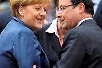 Francois Hollande et Angela Merkel. (C)LIONEL BONAVENTURE / AFP