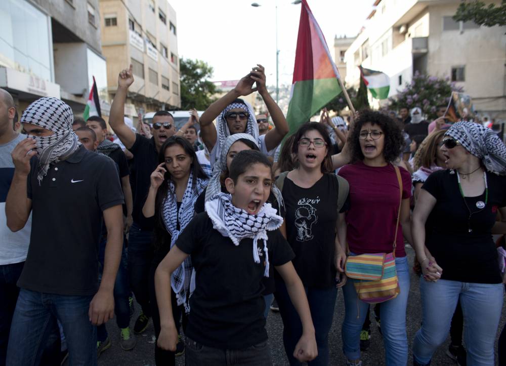Manifestations d'Arabes israéliens contre l'offensive israélienne sur Gaza, à Nazareth, le 21 juillet ©  AHMAD GHARABLI / AFP PHOTO