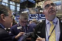 Wall Street accueille avec le sourire une salve de r&eacute;sultats d'entreprises