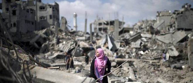 Les habitants de Gaza reviennent dans leurs maisons detruites, samedi matin, durant le cessez-le-feu de 12 heures.