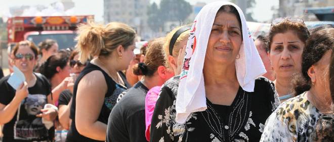 En Pelerinage A Lourdes Les Chretiens D Irak Prient Pour La Paix Le Point